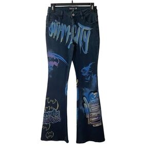 Dolls Kill x DC Graphic Flare Jeans with Blue and Yellow Accents